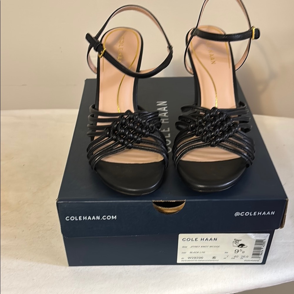 Cole Haan Black Wedge Sandals with Ankle Straps and Intricate Design